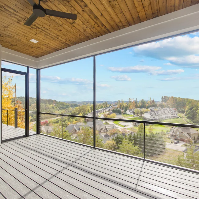 Screened porch with glass railing overlooking the hills in Contemporary Luxury, a custom home by Mike Stevens Homes
