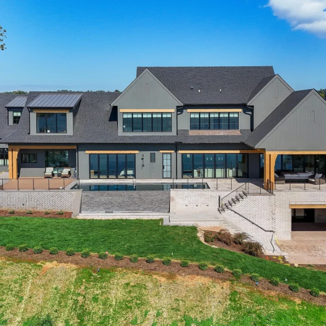 Aerial of Edgewater Estate, a custom lake home on a private peninsula by Mike Stevens Homes