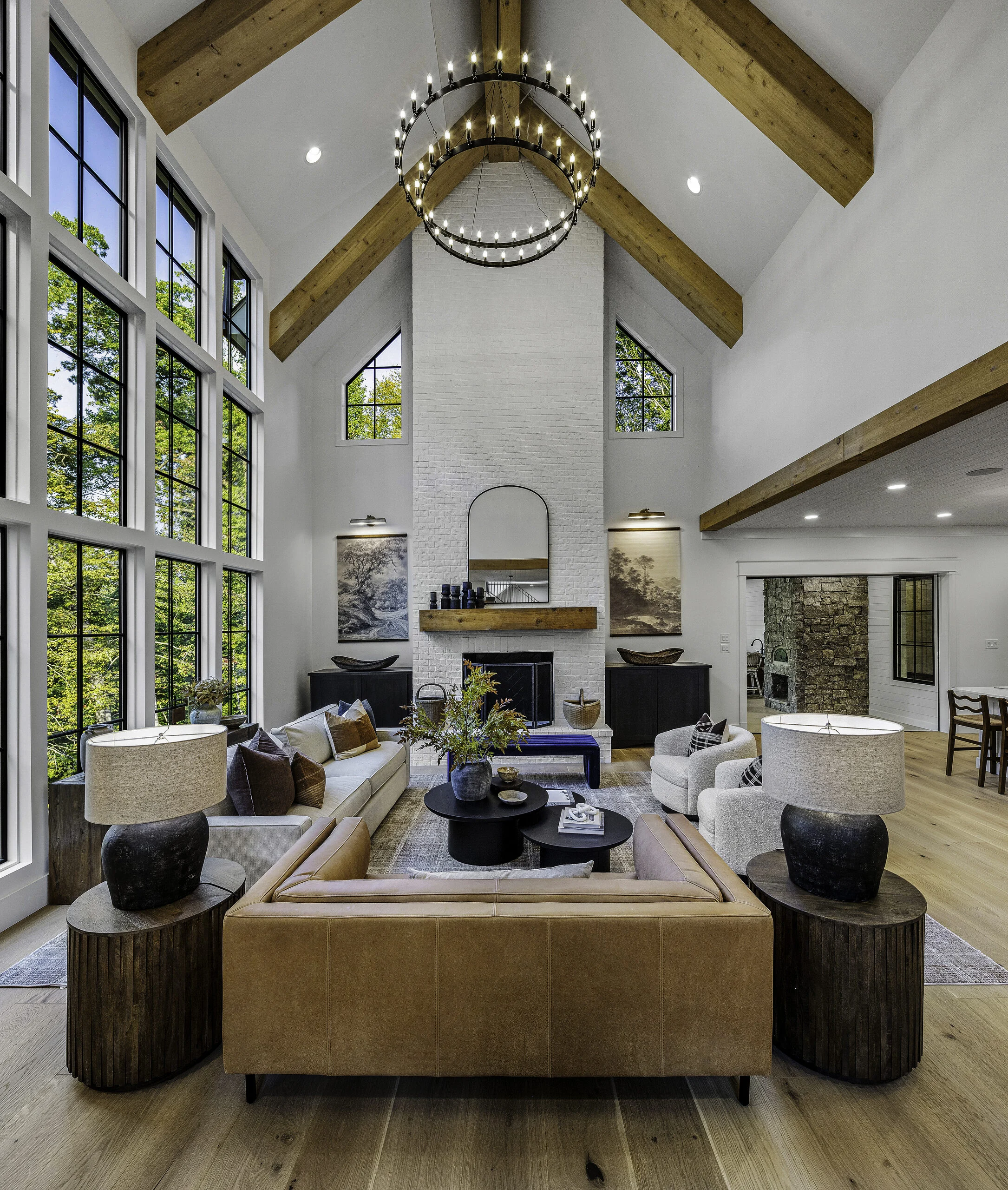 Two-story great room with beamed ceiling and fireplace in Gettysvue Overlook, a custom home by Mike Stevens Homes