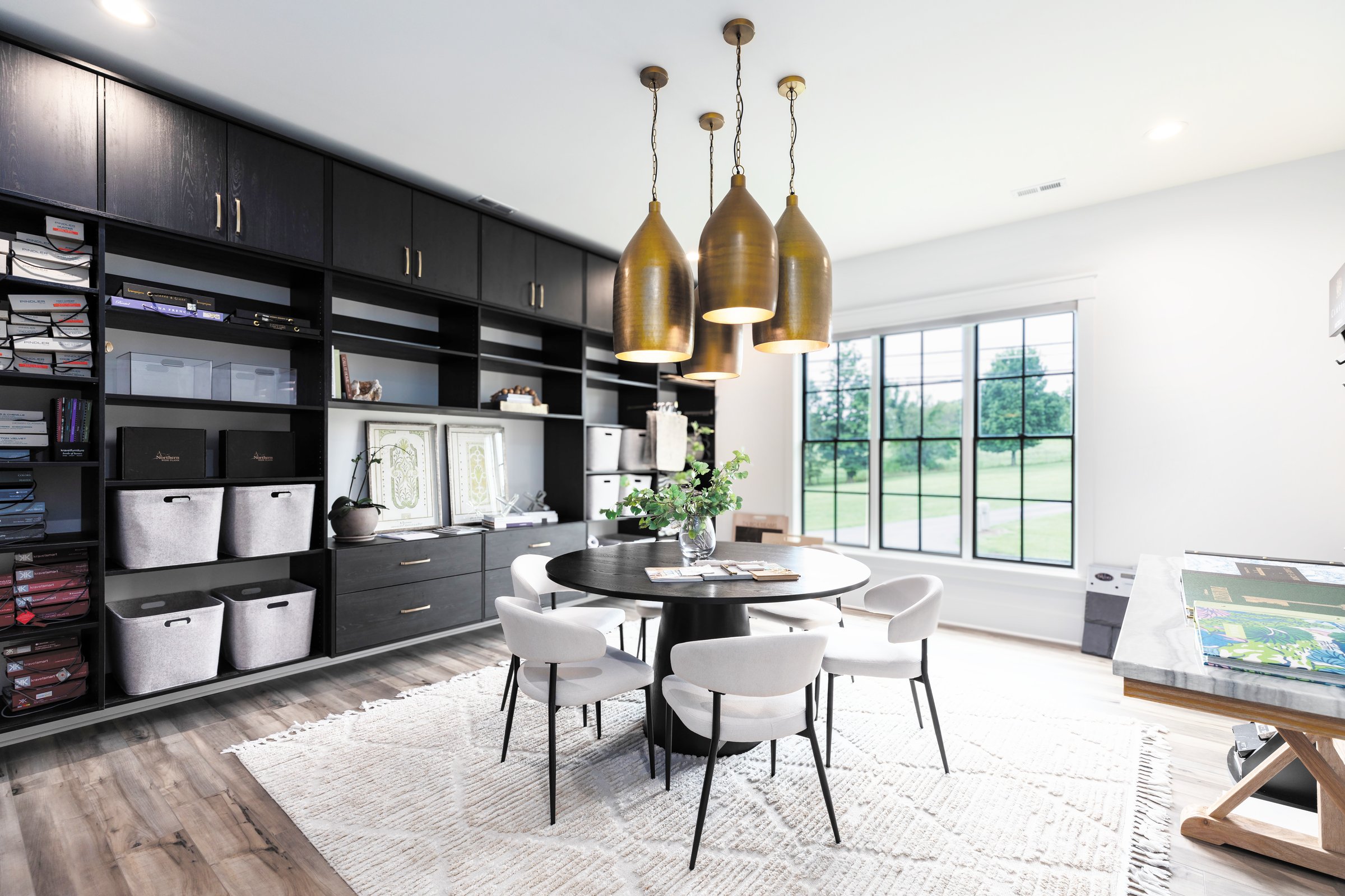 The Mike Stevens Homes design center, with its sample library and selections table