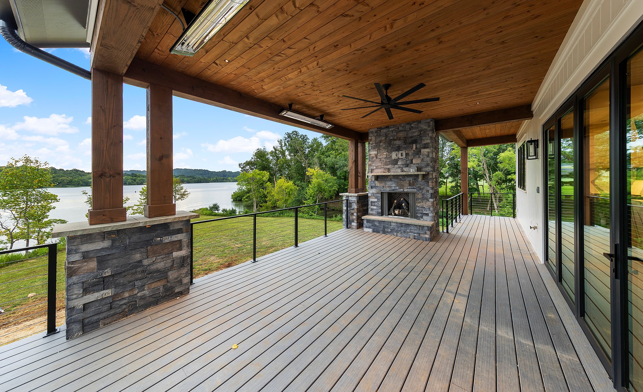 Covered outdoor living space overlooking the lake