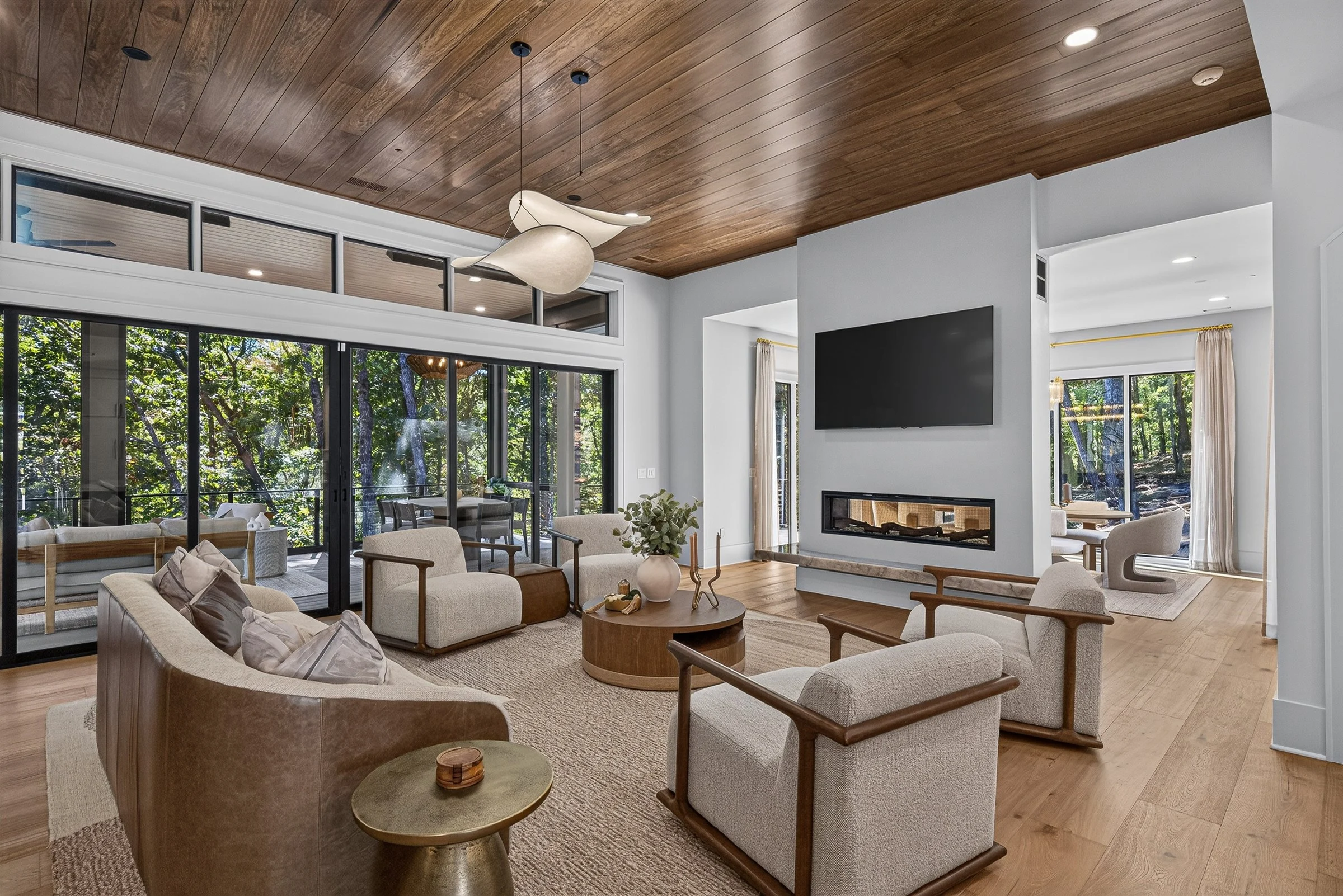 Wood ceiling and glass doors in Shino No Mori, a custom home in Tennessee National, Loudon, TN by Mike Stevens Homes.